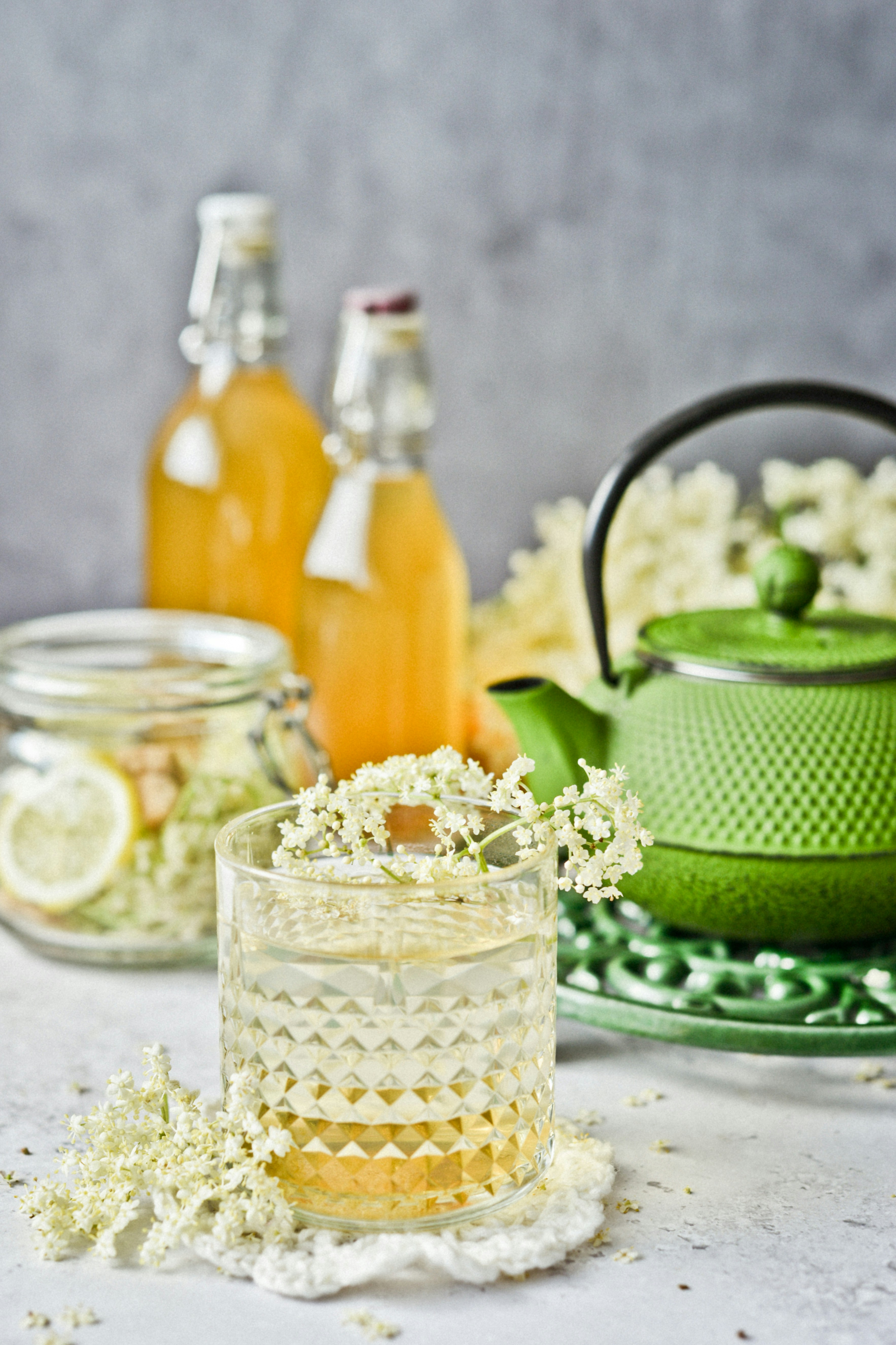 clear glass pitcher beside clear glass cup