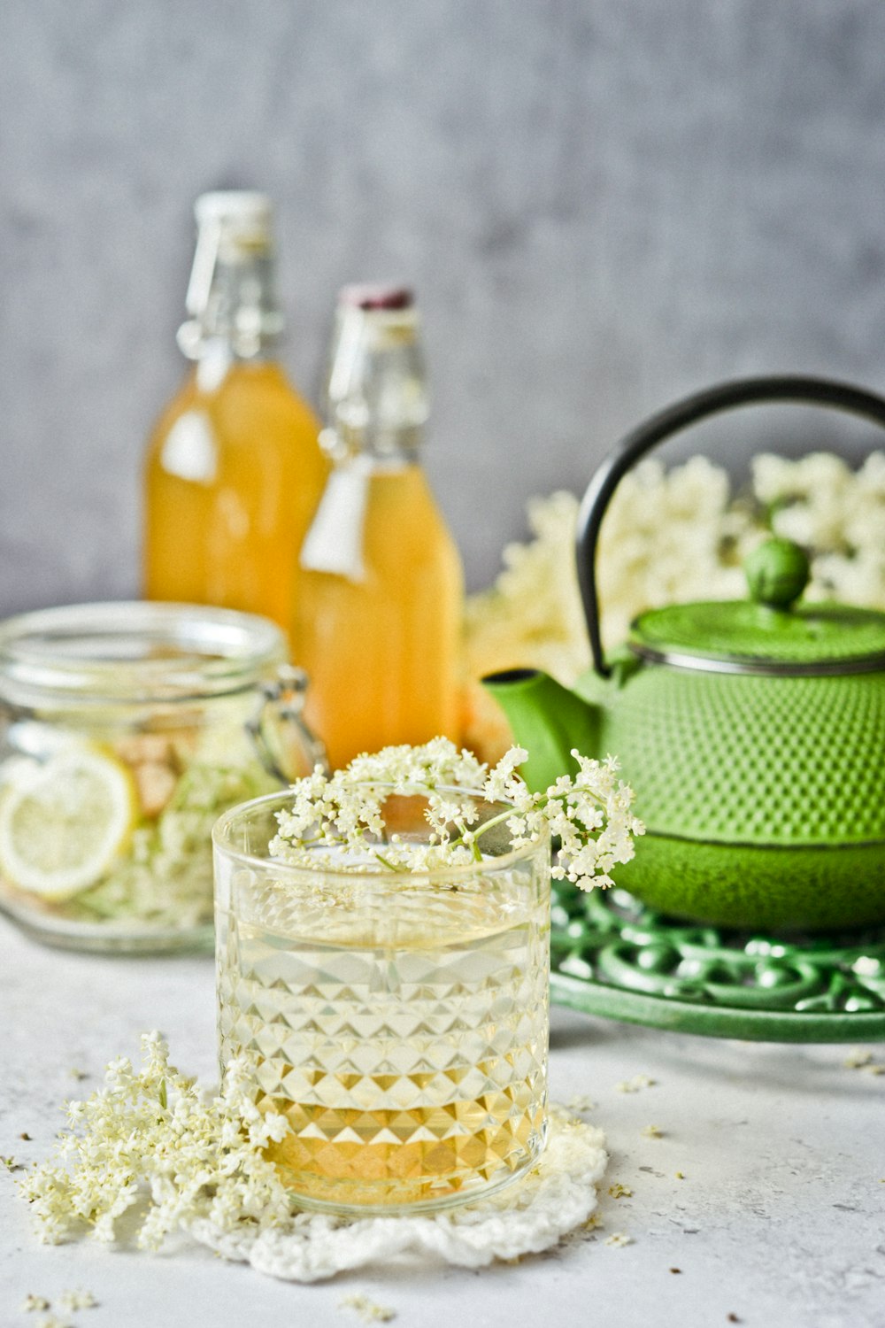 clear glass pitcher beside clear glass cup