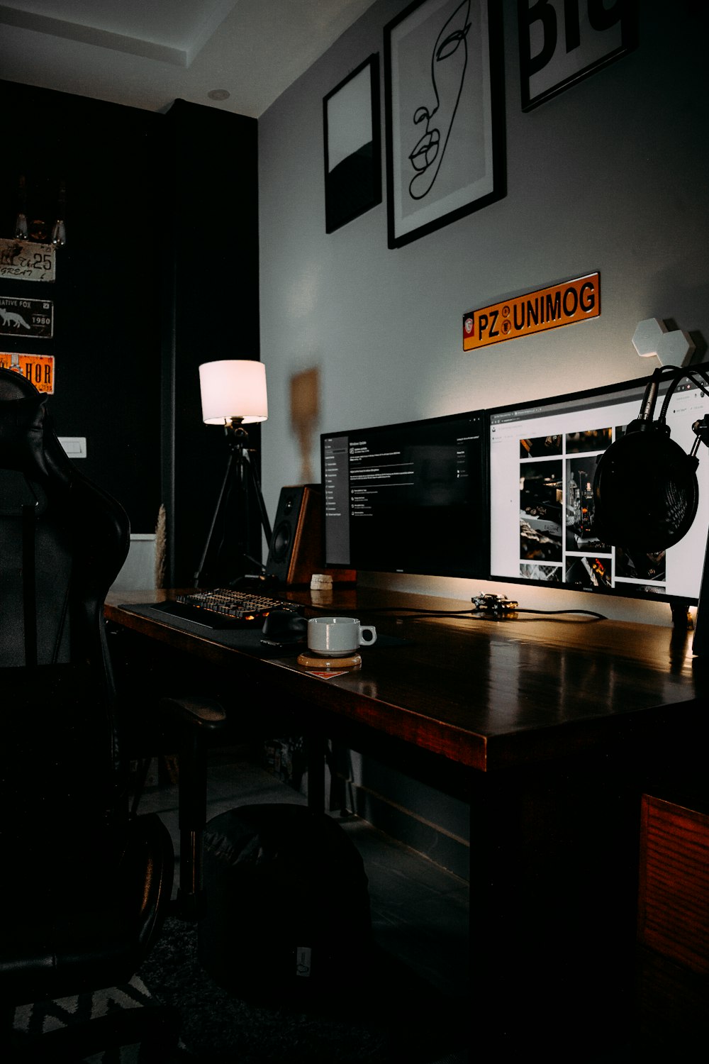 black flat screen computer monitor on brown wooden desk