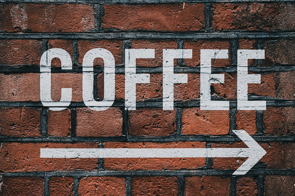 brown brick wall with white and black brick wall