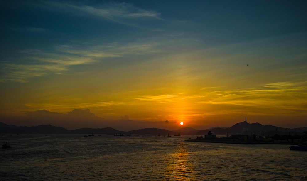 silhouette of mountain during sunset