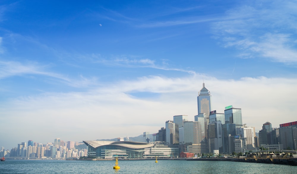 city skyline under blue sky during daytime