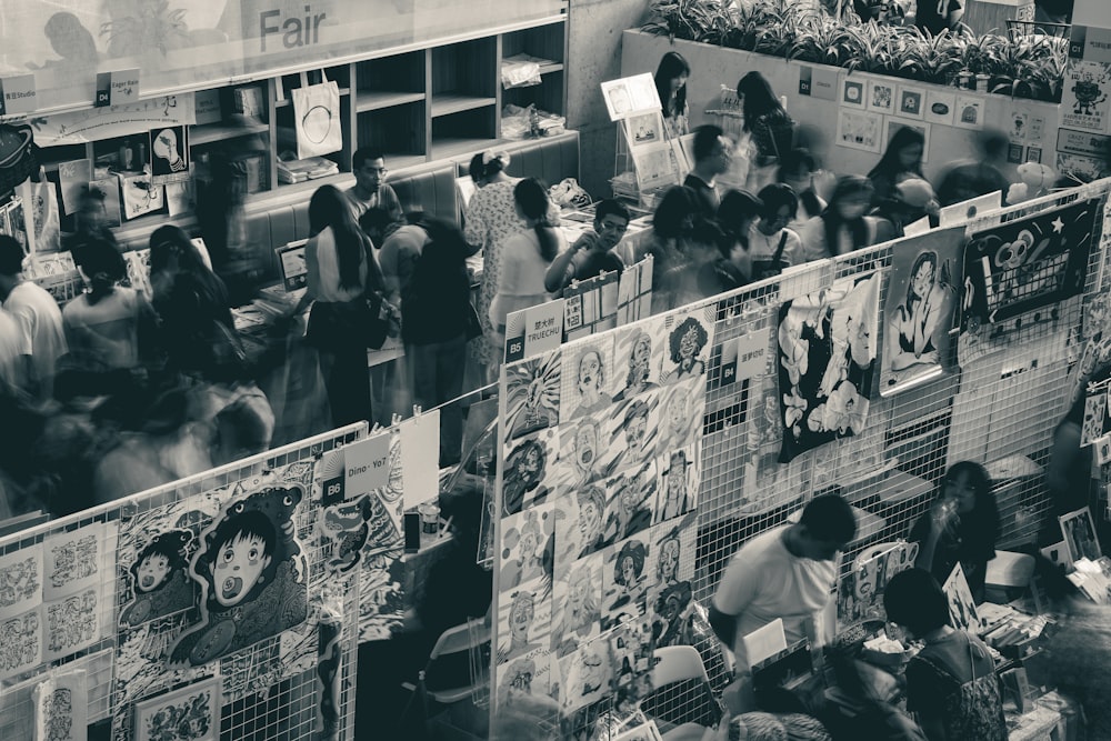 grayscale photo of people gathering on street