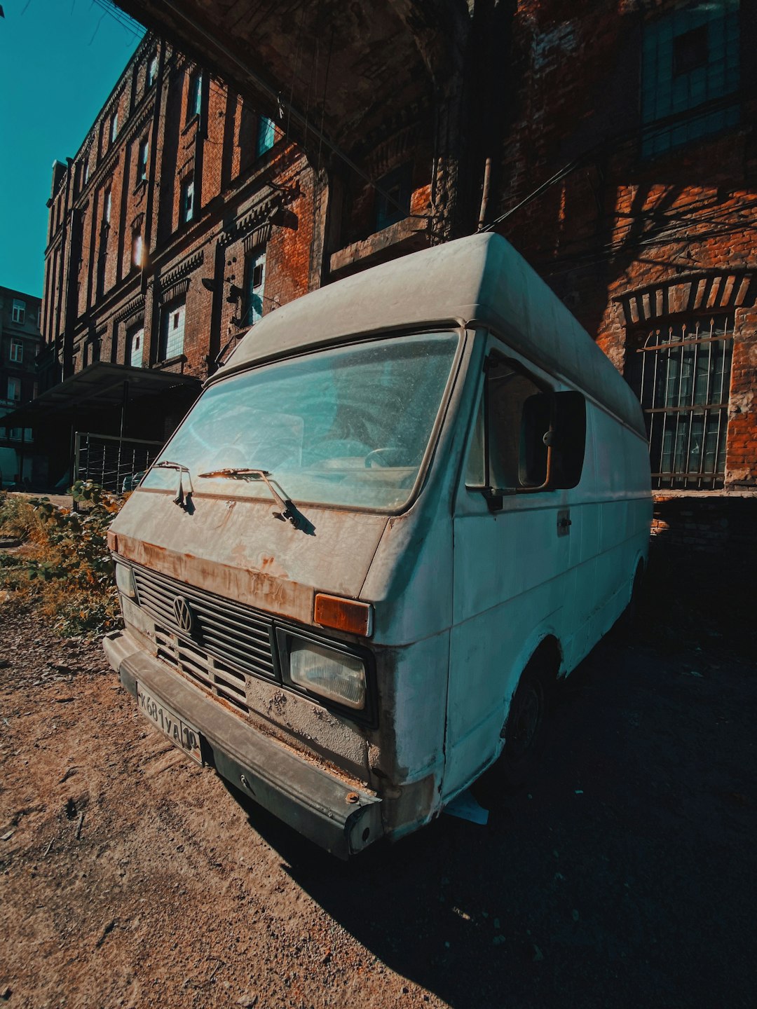 white van parked on side of the road