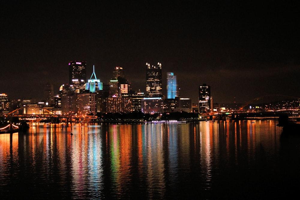 city skyline during night time