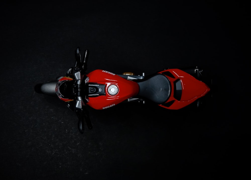 red and black motorcycle toy