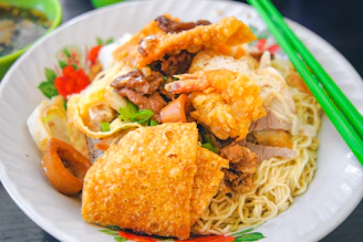 pasta with sauce and vegetable dish