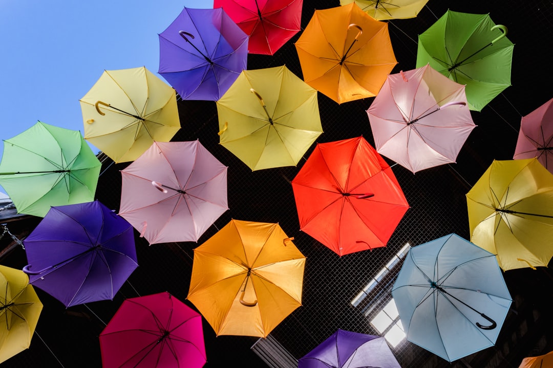 assorted color umbrellas under blue sky during daytime