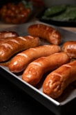 sausage on white ceramic plate
