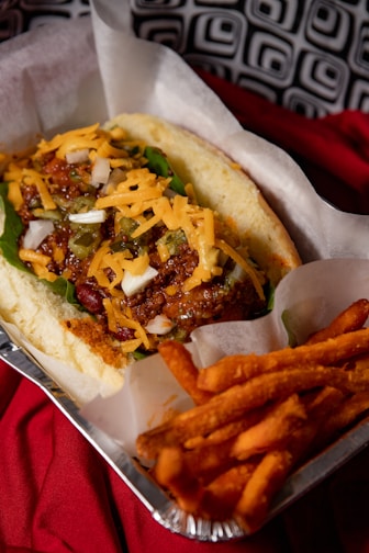 brown and yellow dish on white paper