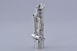 stainless steel tube on white surface