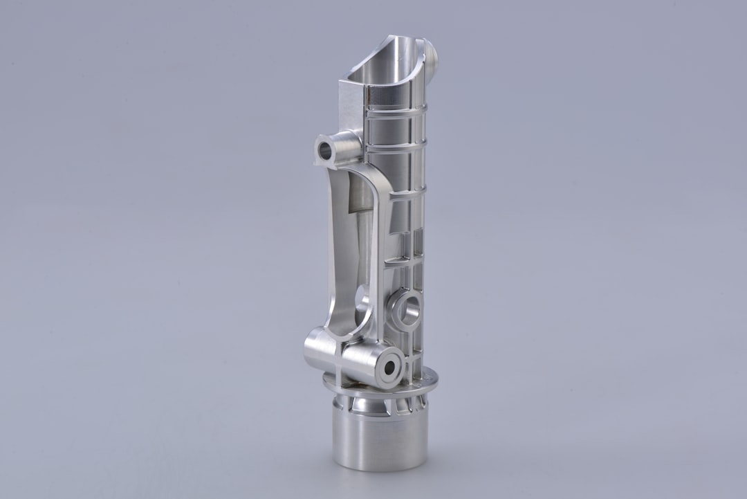 stainless steel tube on white surface, cnc machining