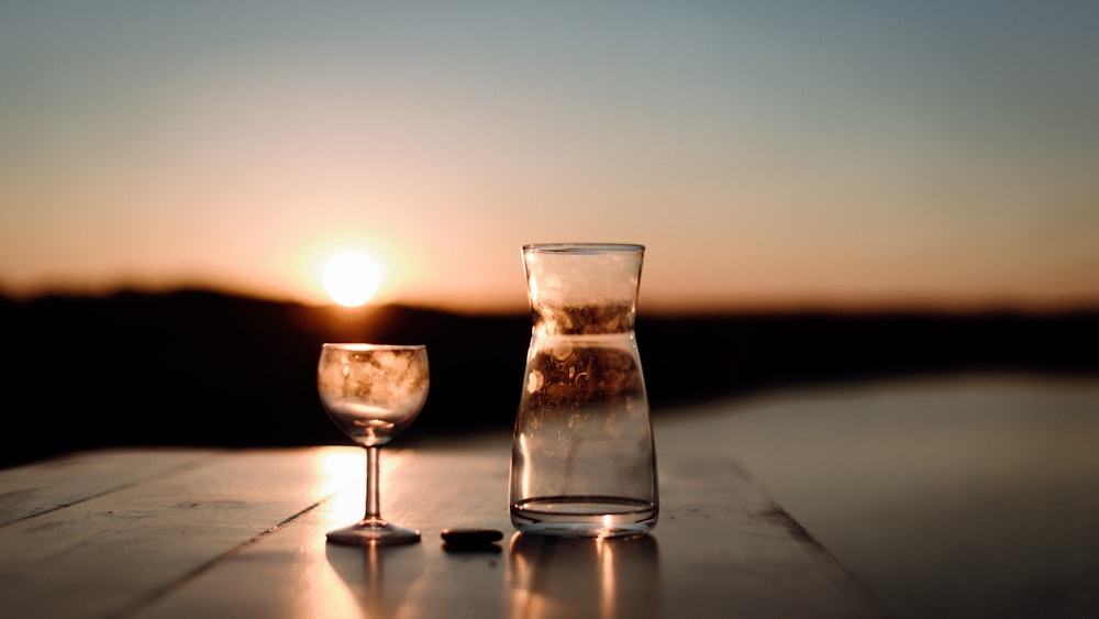 clear drinking glass on white table