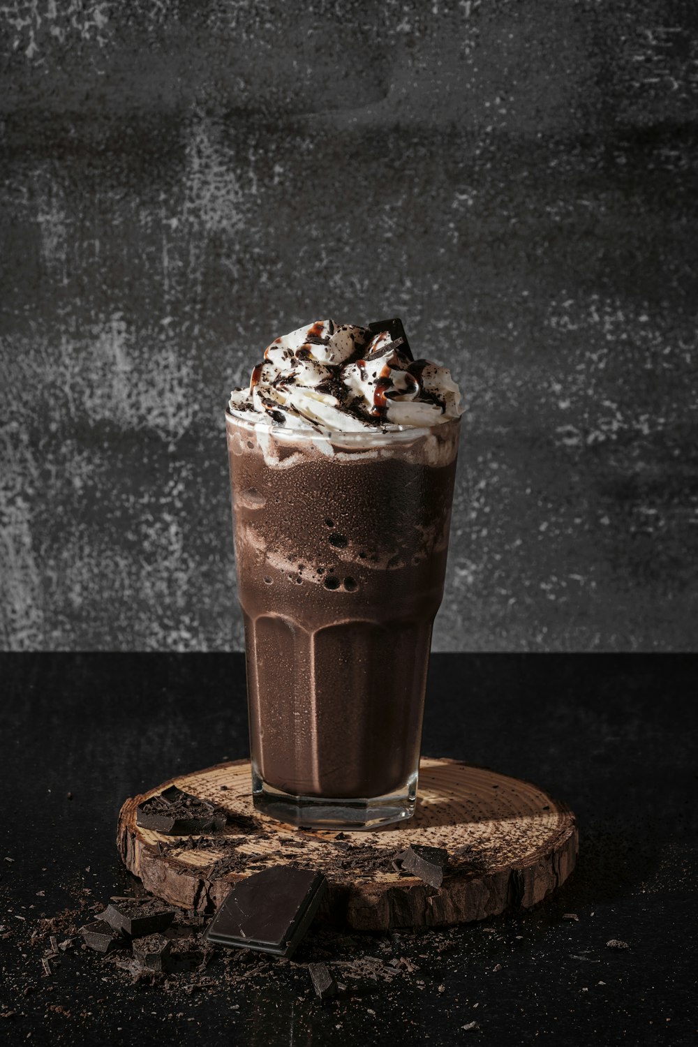 chocolate ice cream on brown wooden coaster