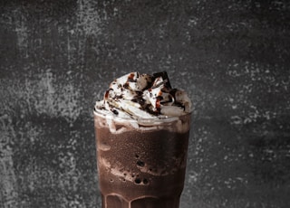 chocolate ice cream on brown wooden coaster