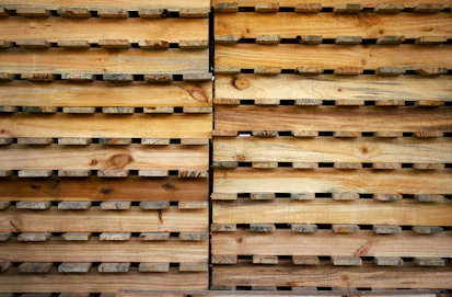 brown wooden crates on white floor
