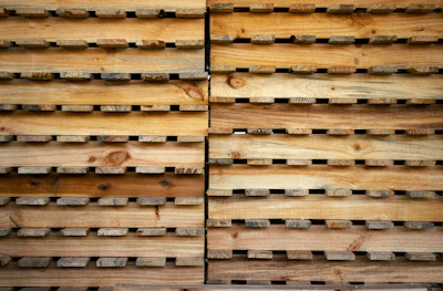 brown wooden crates on white floor
