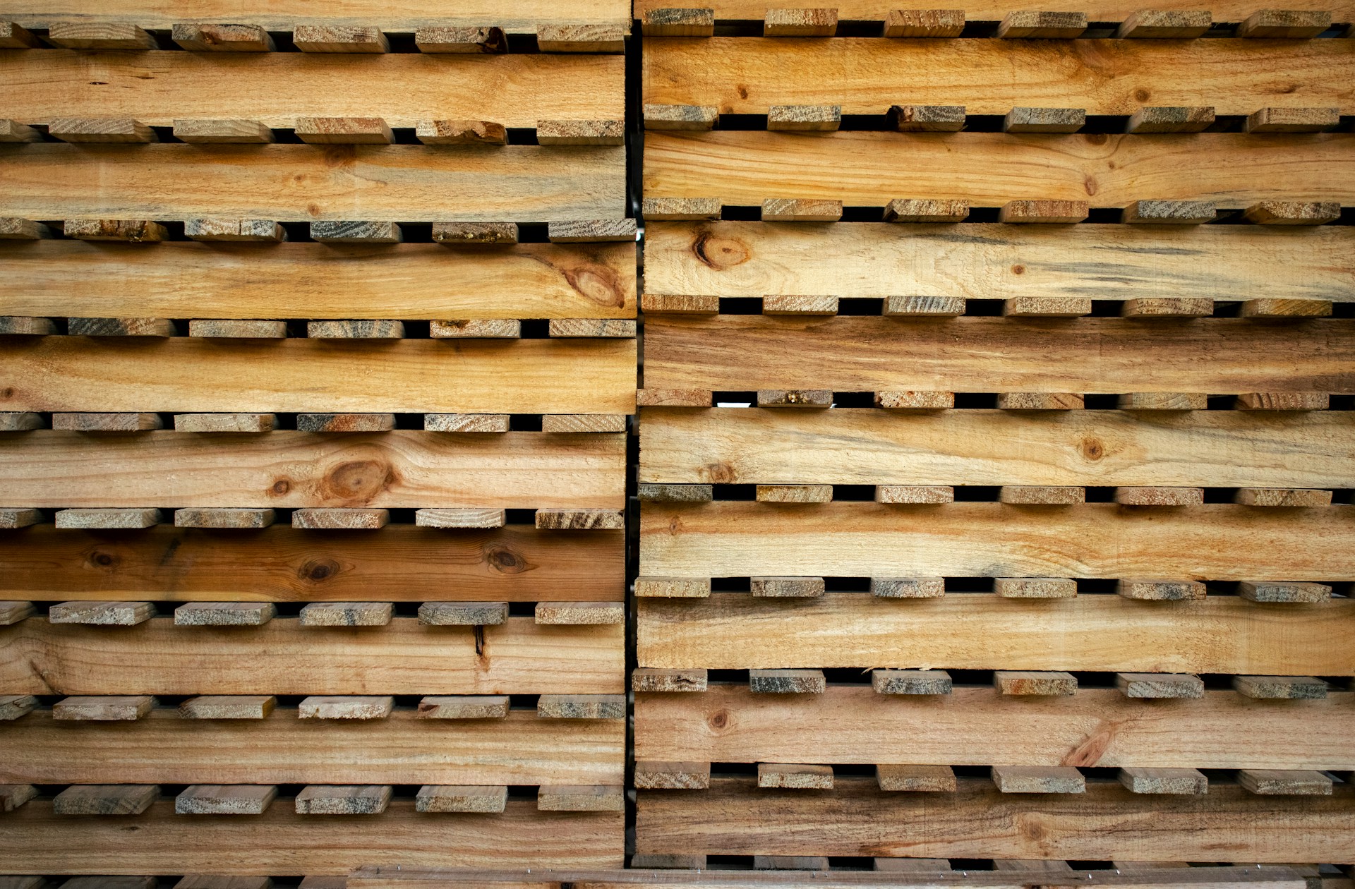 brown wooden crates on white floor