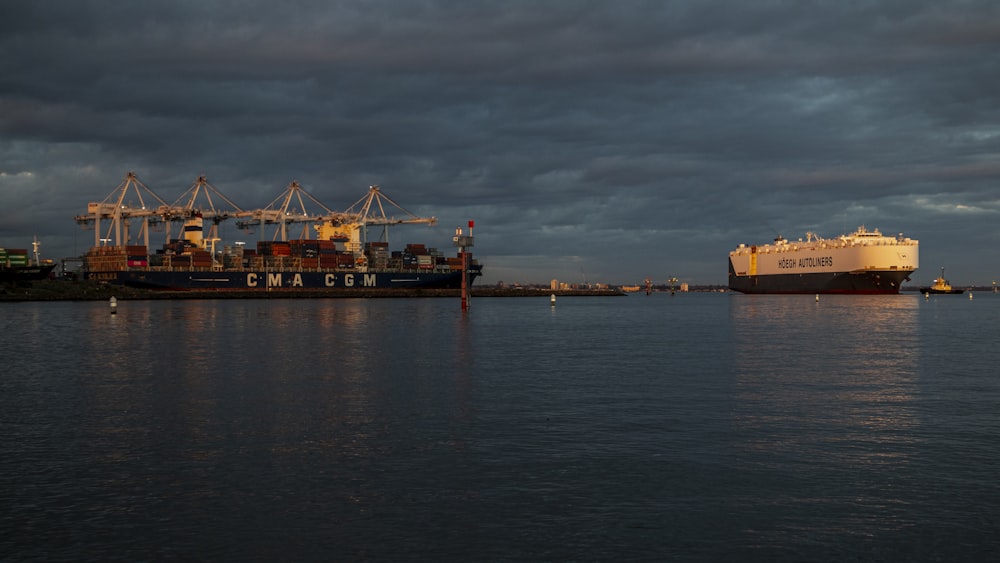 red and white cargo ship on sea during daytime