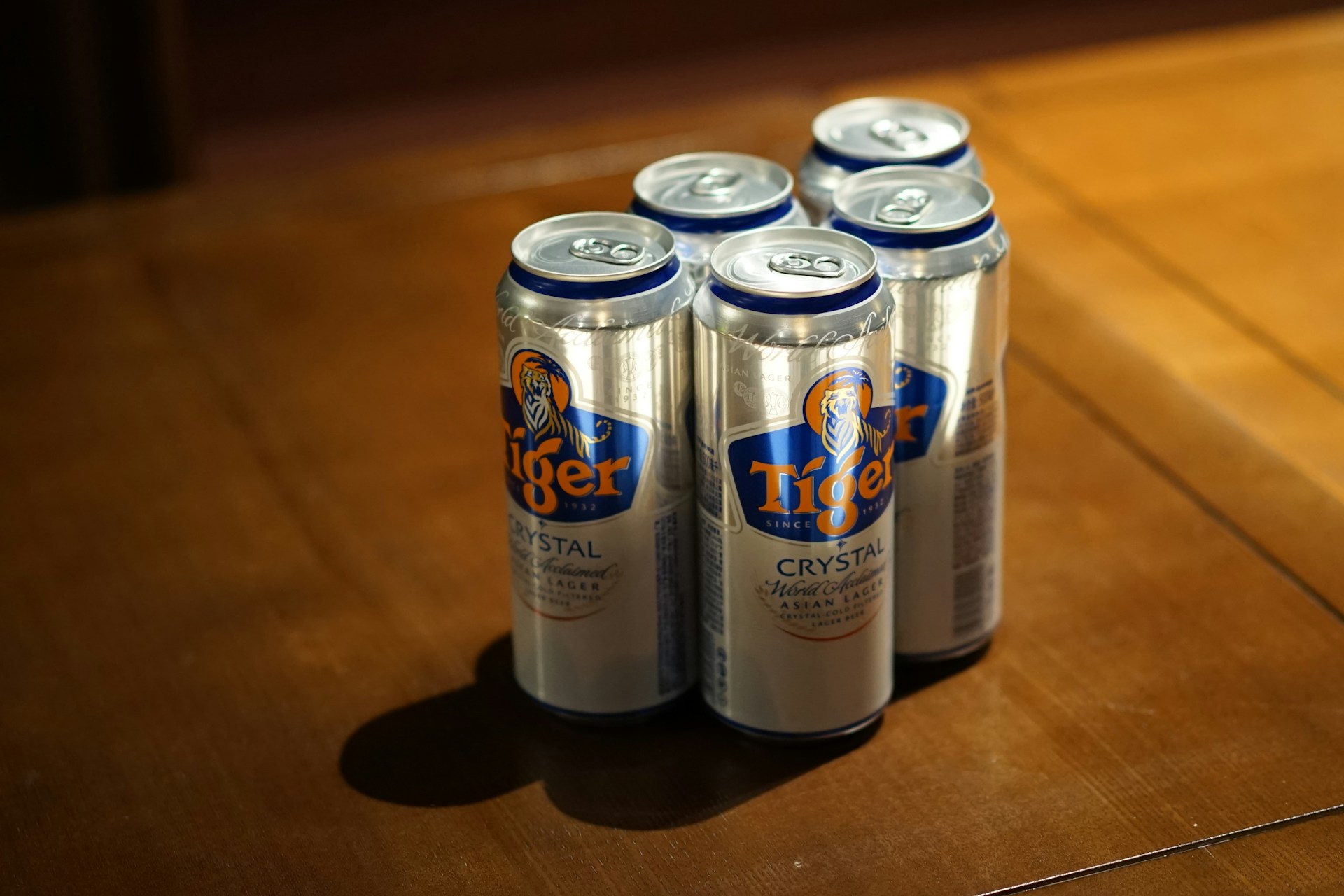 two white and blue labeled cans