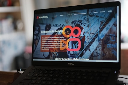 black laptop computer turned on displaying game application