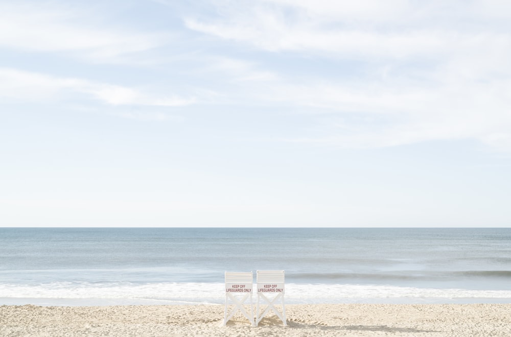 white sand beach during daytime