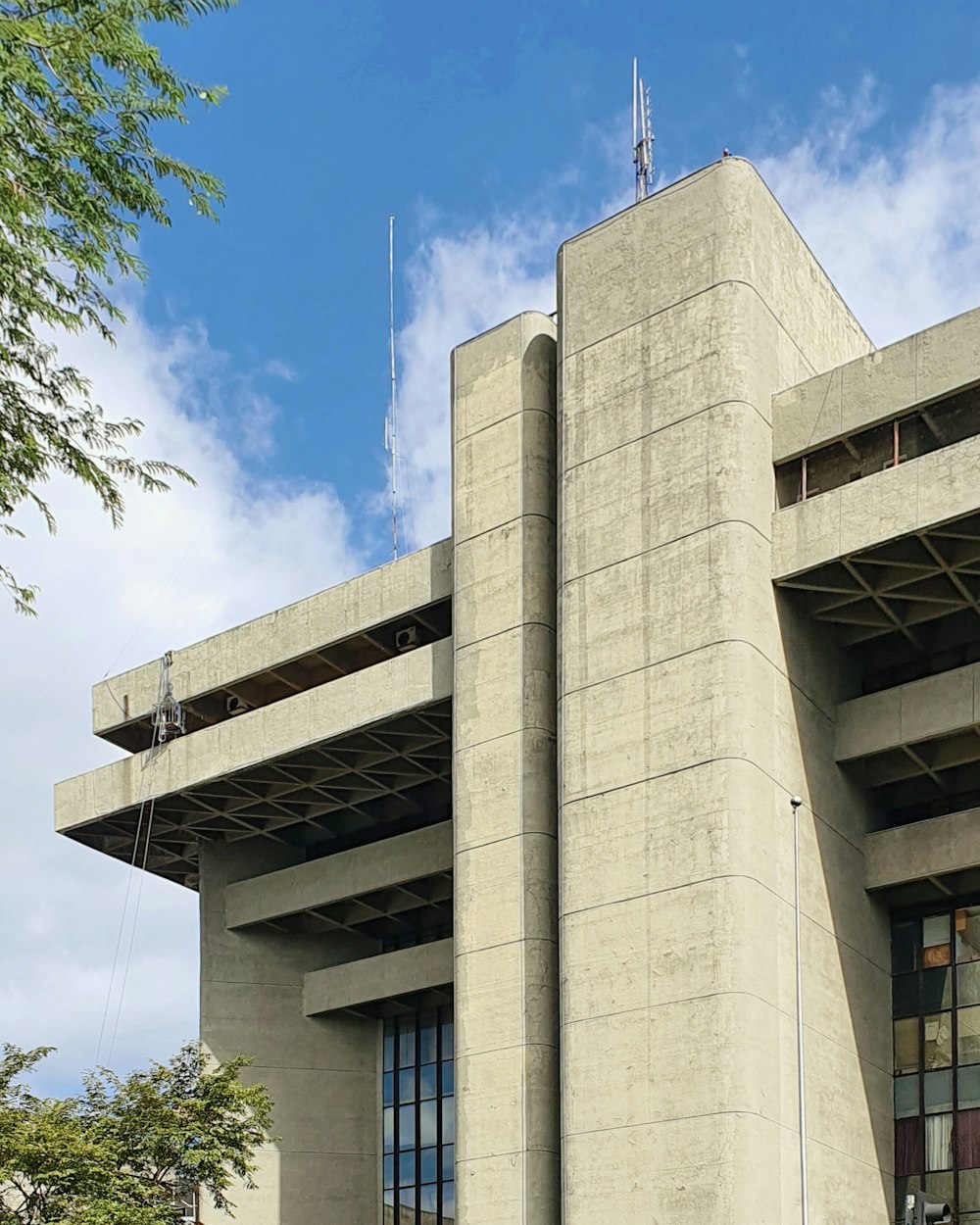 white concrete building under blue sky during daytime