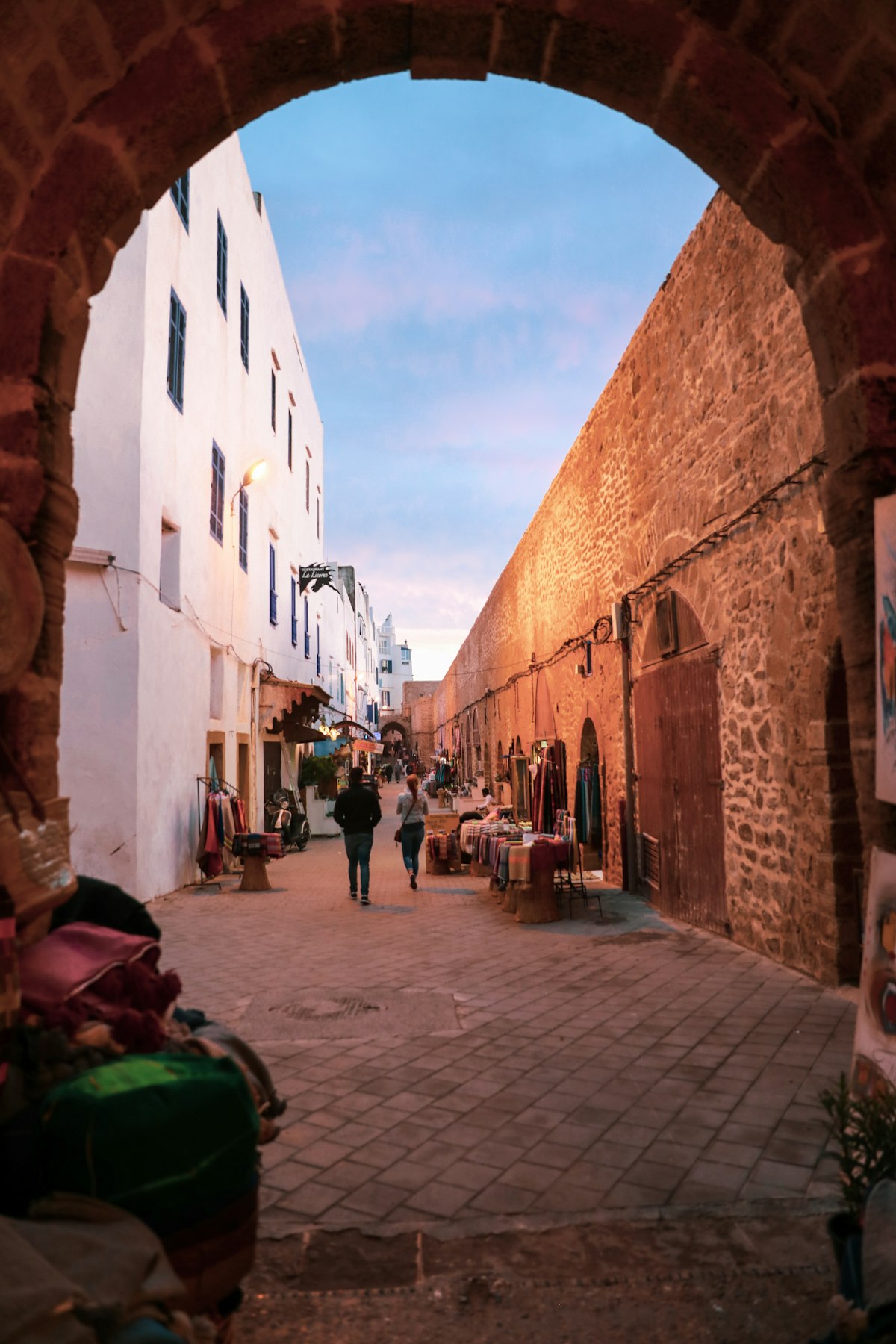 Essaouira new town market with locals shopping for fresh produce