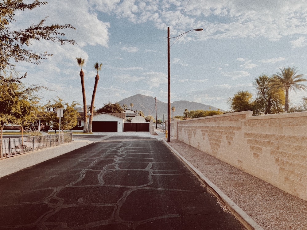 gray concrete road with no cars during daytime