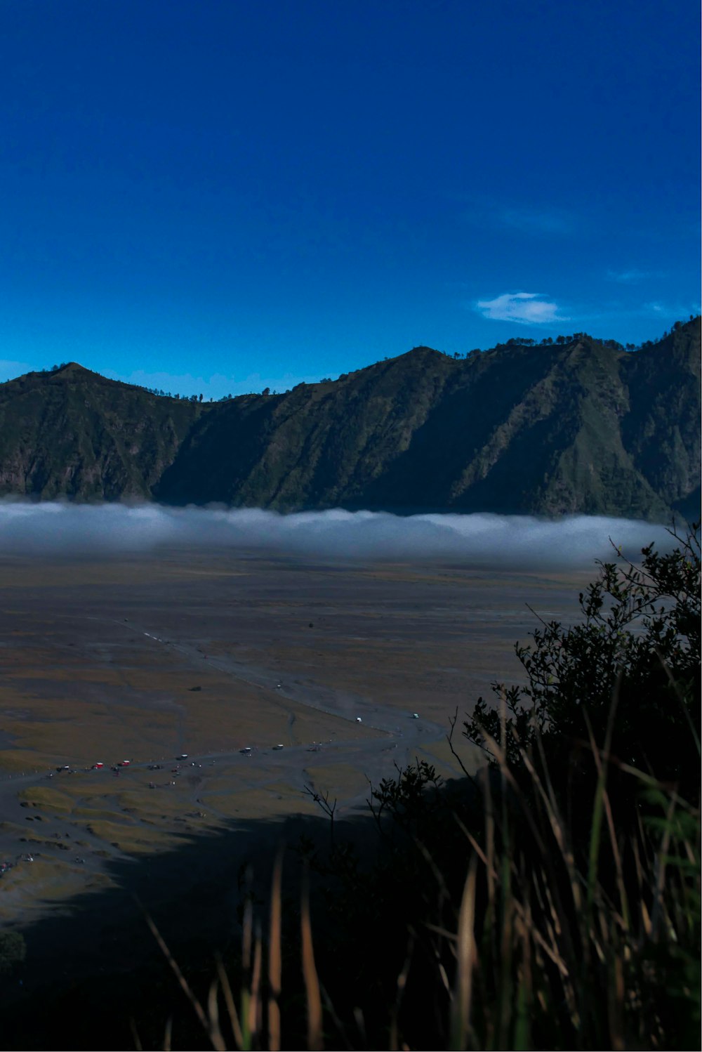 a large body of water surrounded by mountains