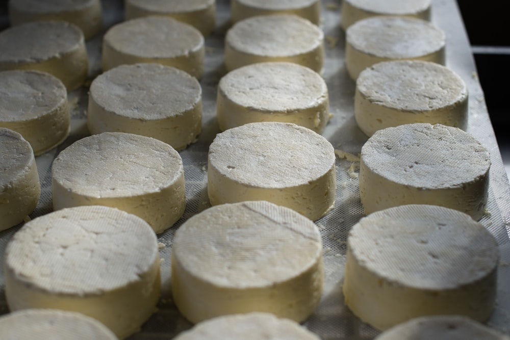 white round food on gray tray