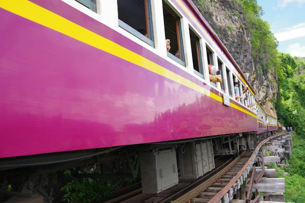 Purple yellow and blue train — Kanchanaburi, Thailand