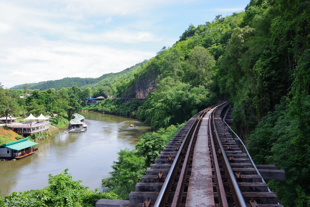 brown wooden bridge over river