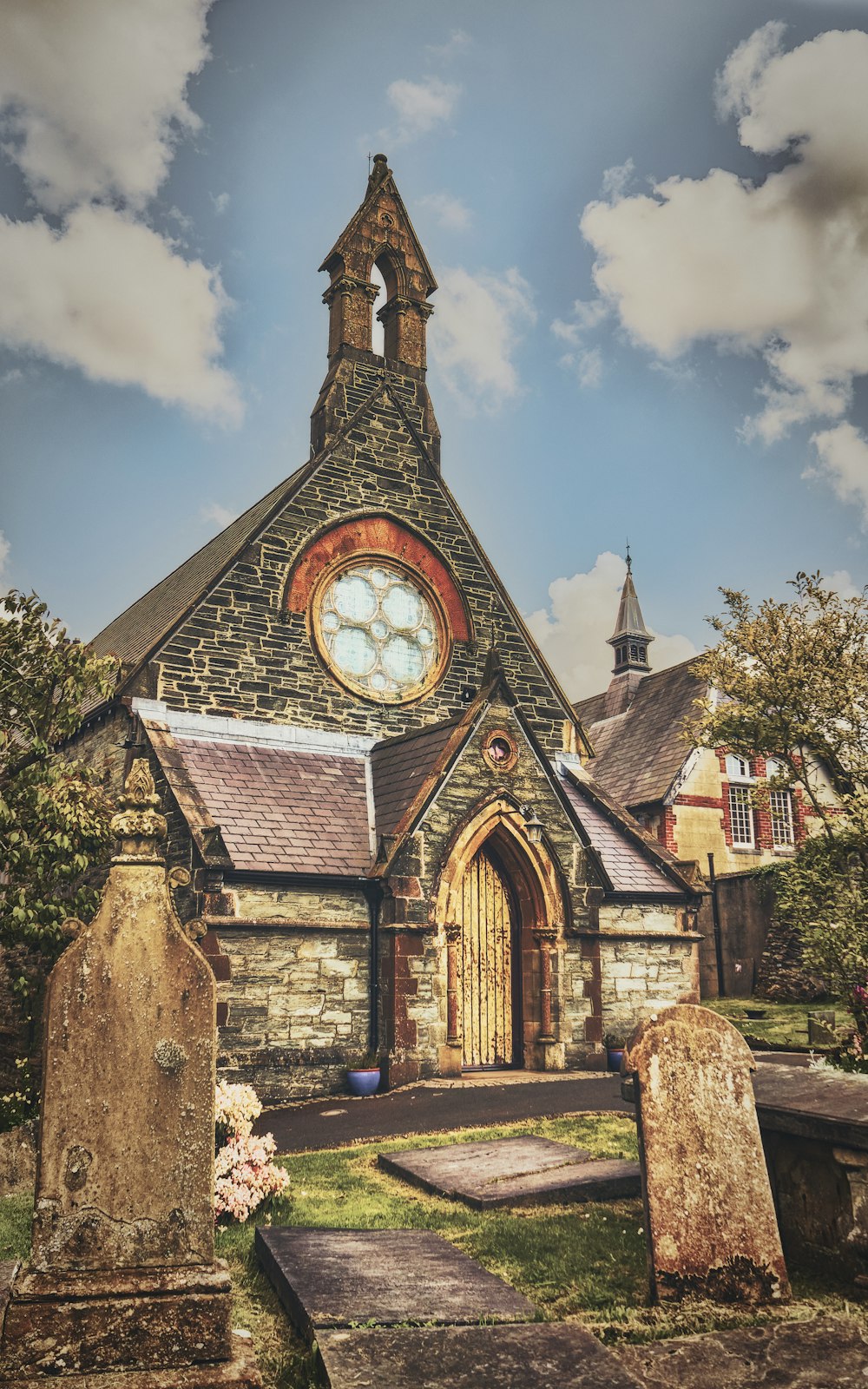 brown and gray concrete church under blue sky during daytime