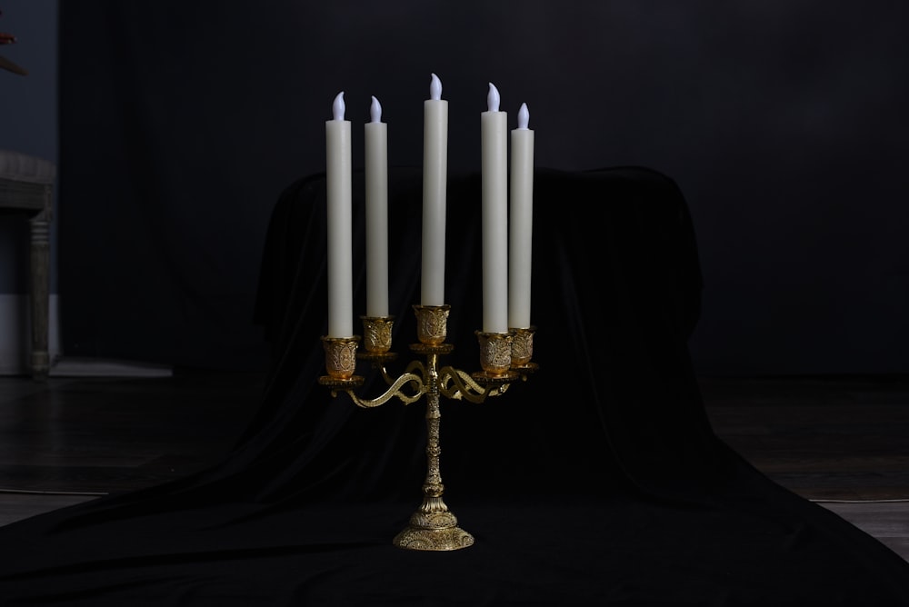 gold and white candle holder