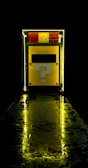 yellow and black door with yellow light