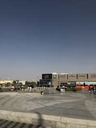 cars parked in front of building during daytime