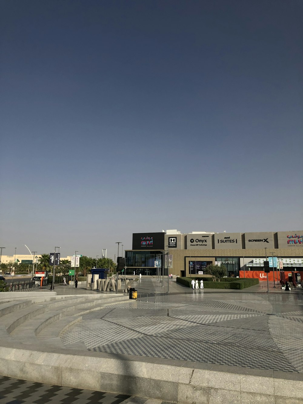 cars parked in front of building during daytime