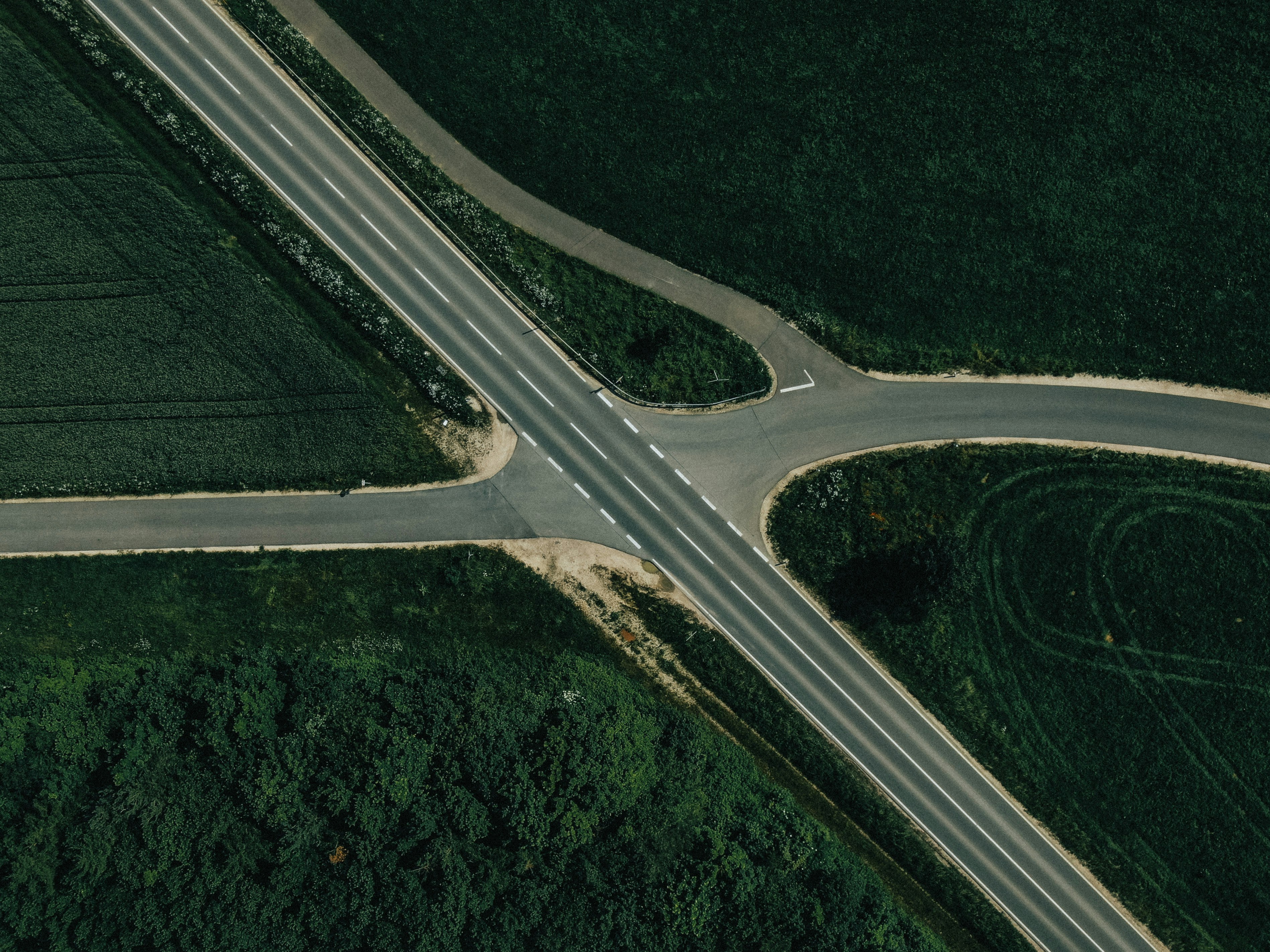 aerial view of gray asphalt road