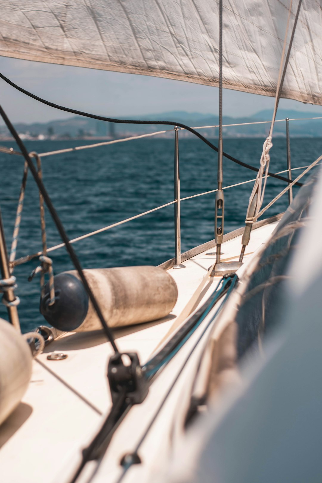 black and silver fishing rod on white boat