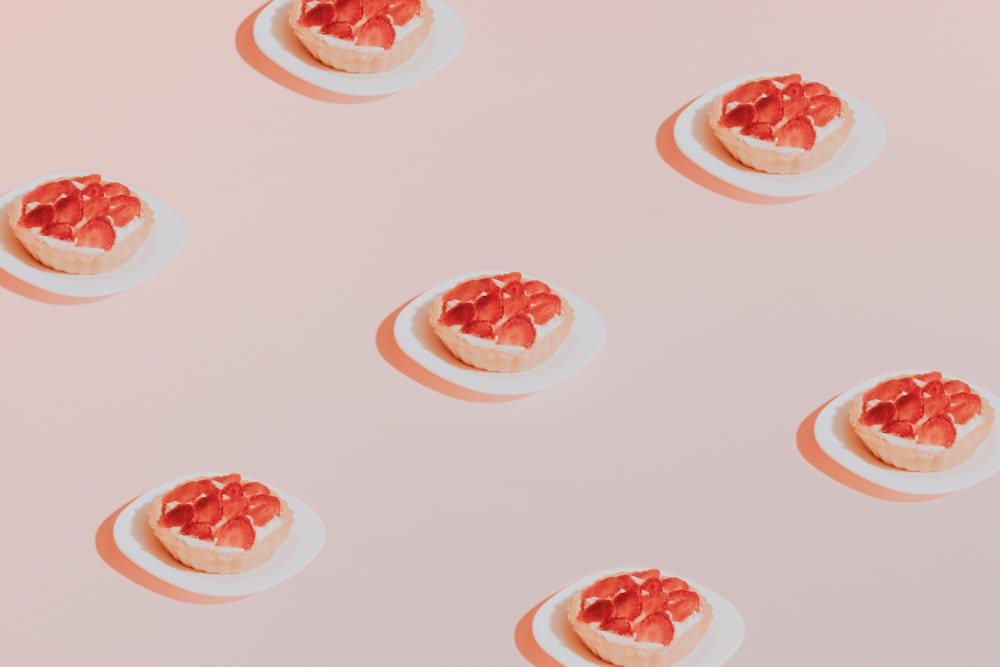 sliced strawberries on white ceramic plate