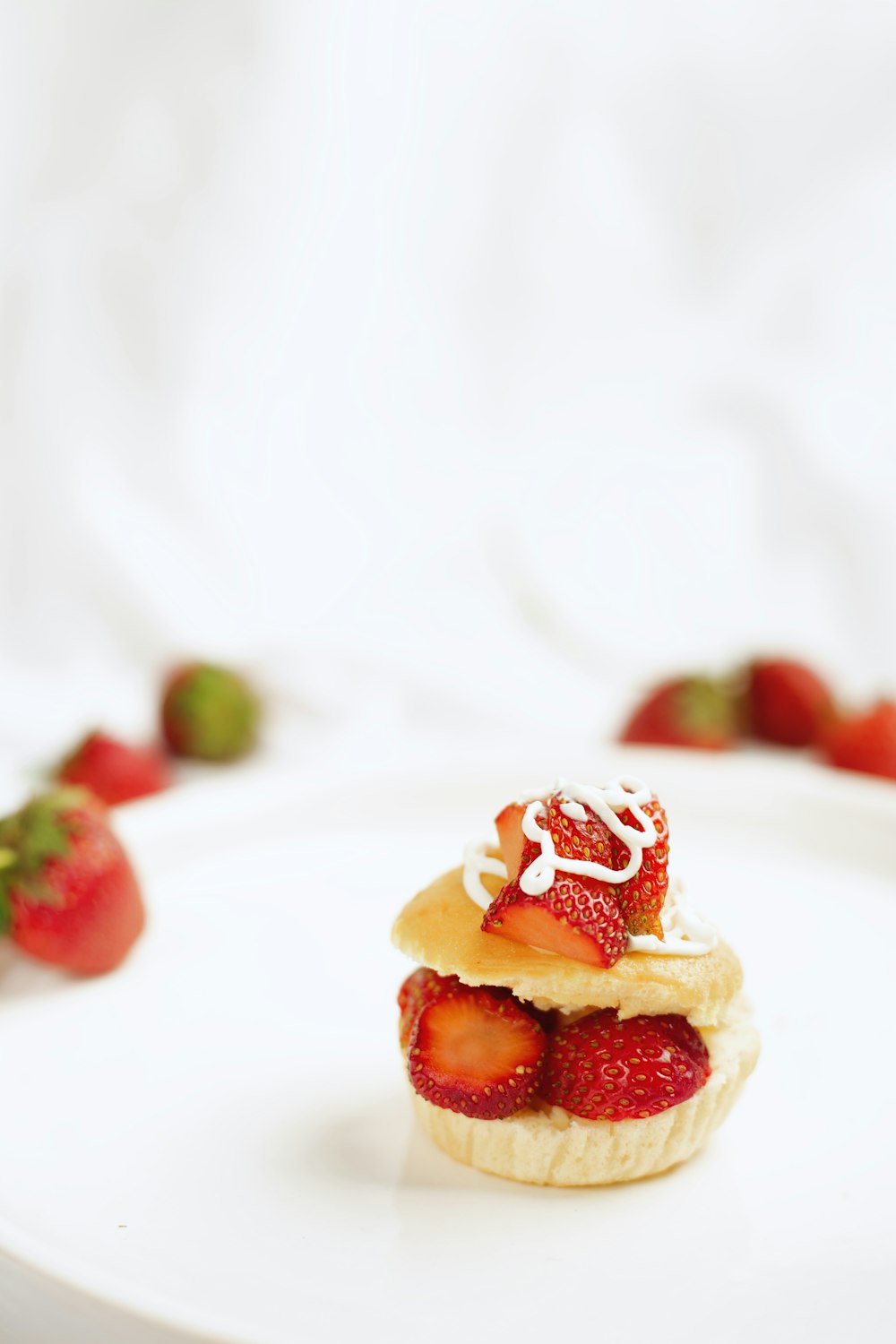 yellow and red cake on white ceramic plate