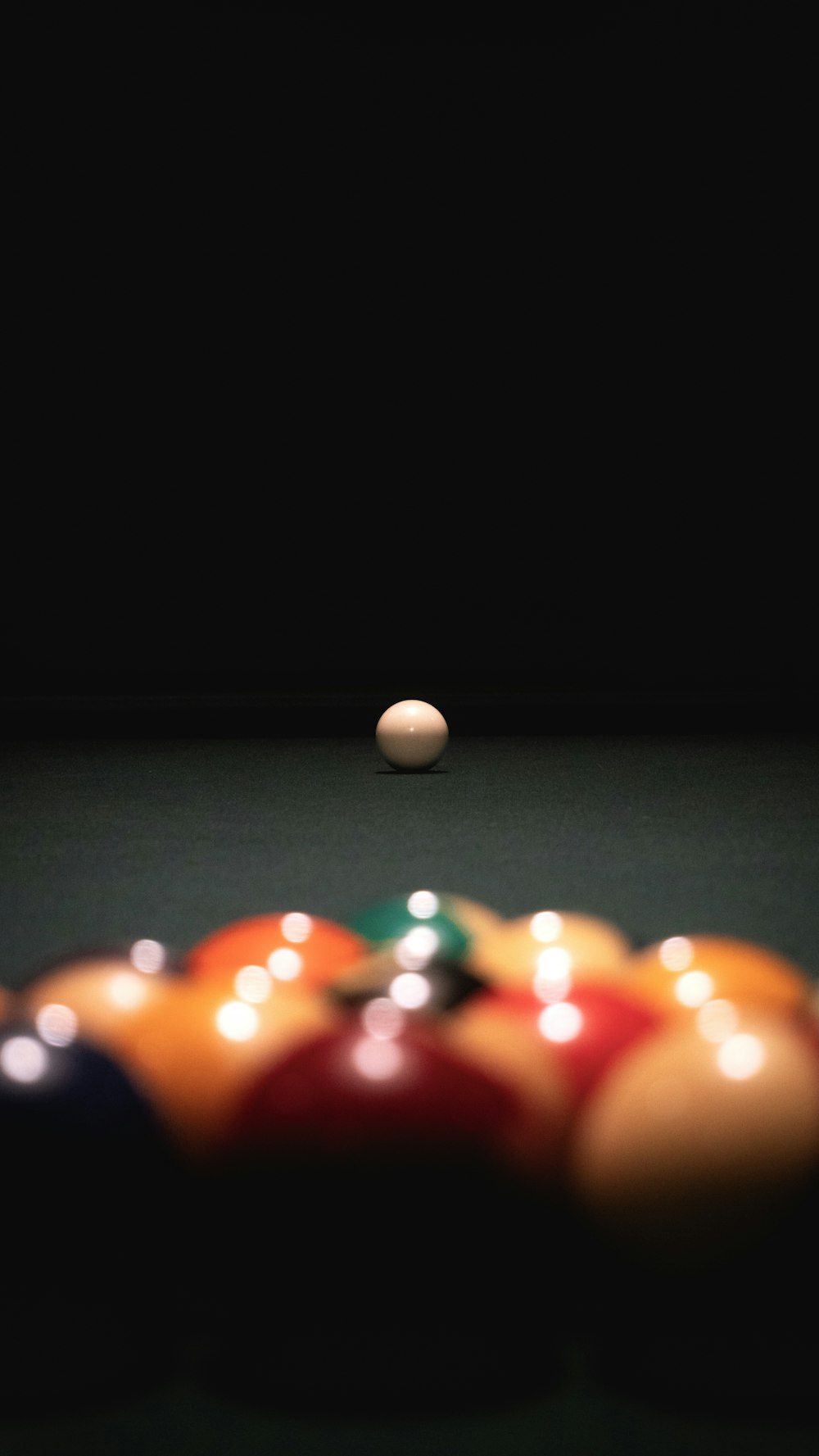 billiard balls on billiard table