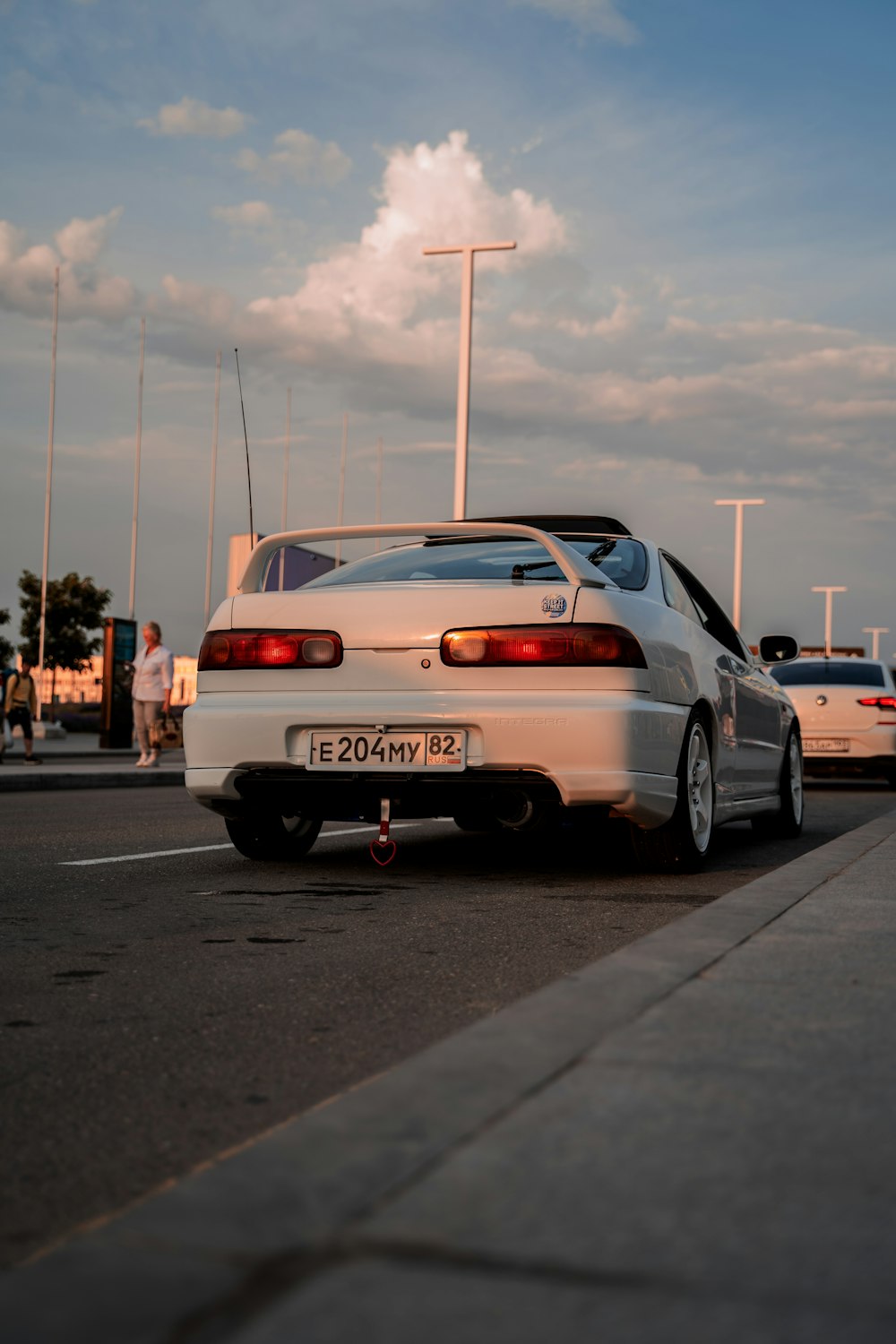 white honda car on road during daytime