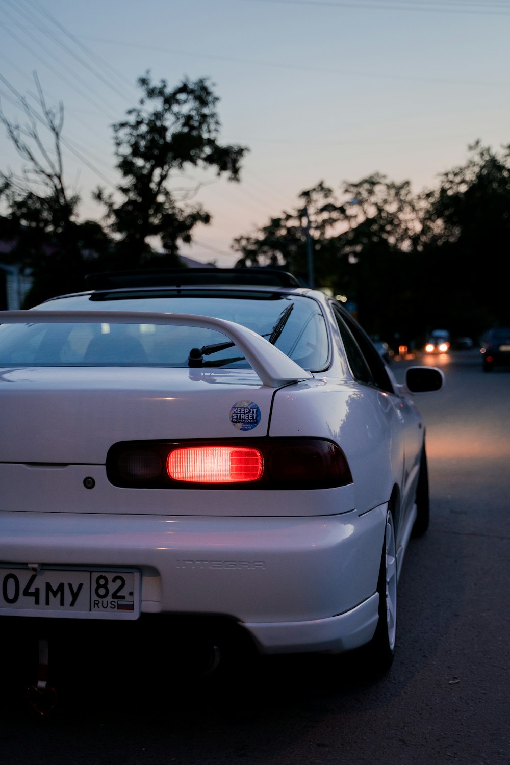 white bmw m 3 on road during daytime