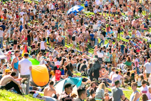Community gathering during a charity event under a bright sunny day