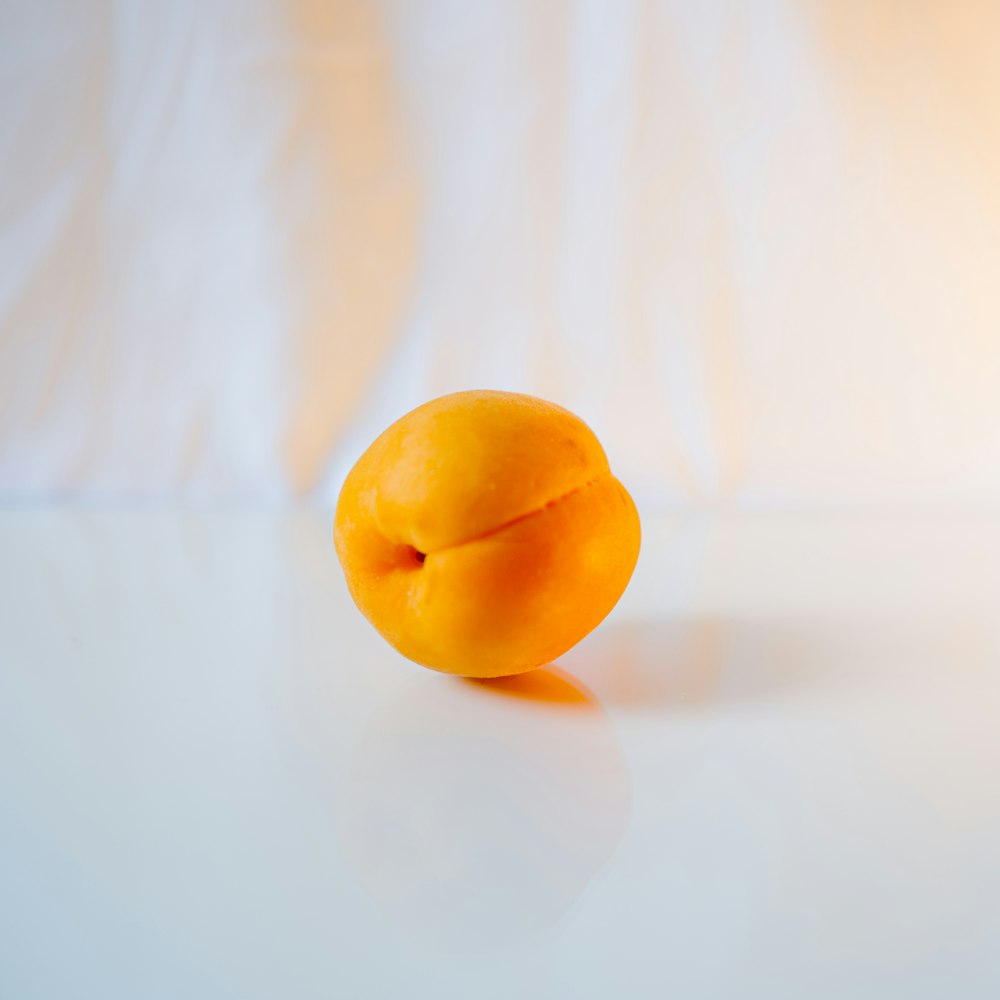 yellow fruit on white textile