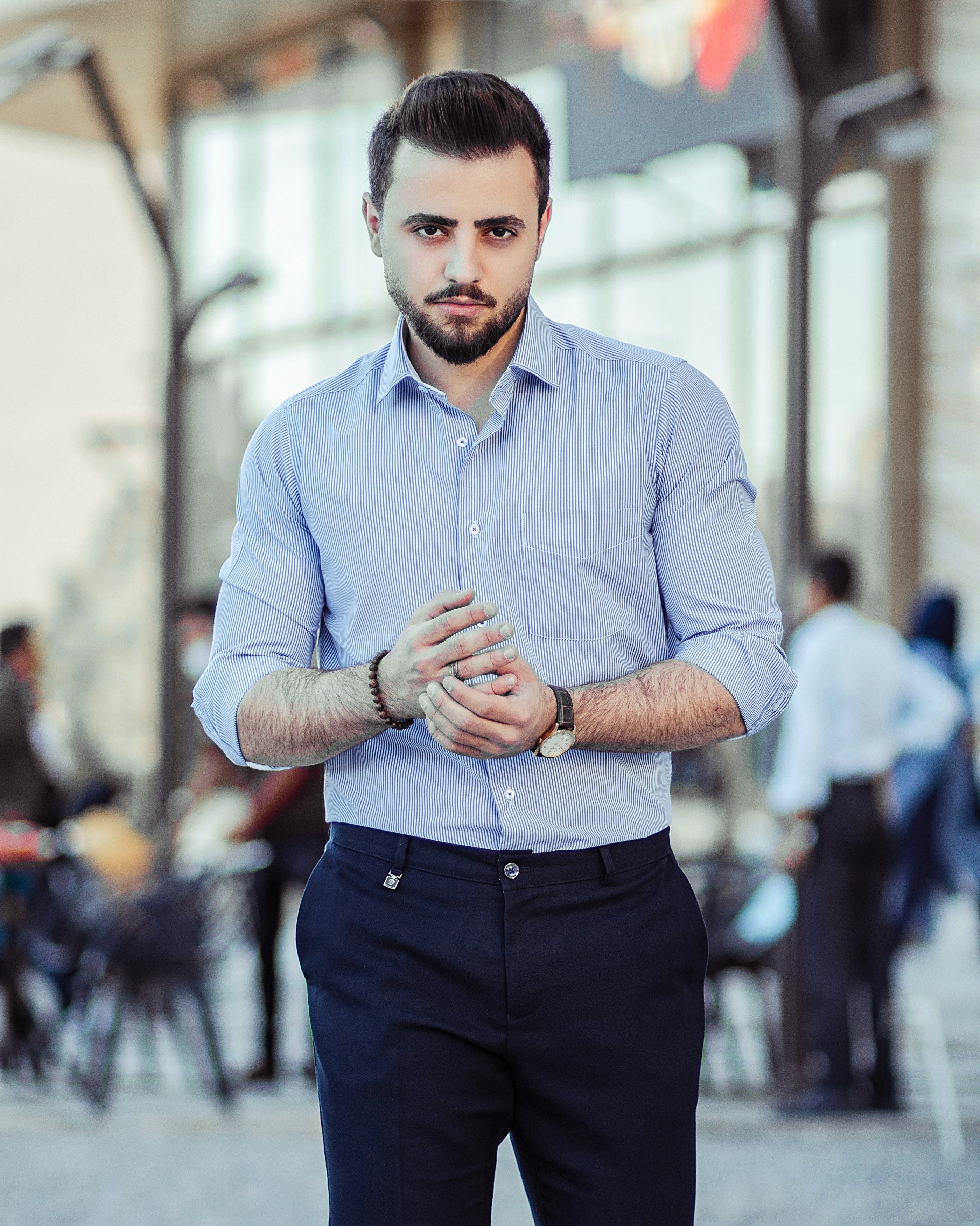 Man in blue dress shirt and black dress pants standing photo ...