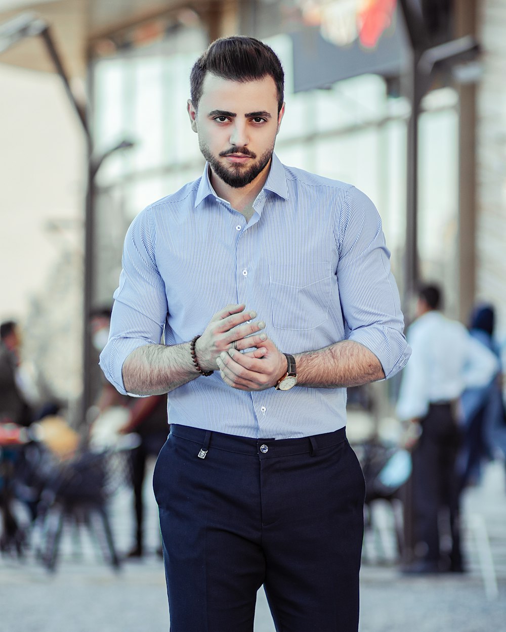 Man in blue dress shirt and black dress pants standing photo – Free Men  portrait Image on Unsplash