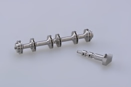 silver steel dumbbell on white surface